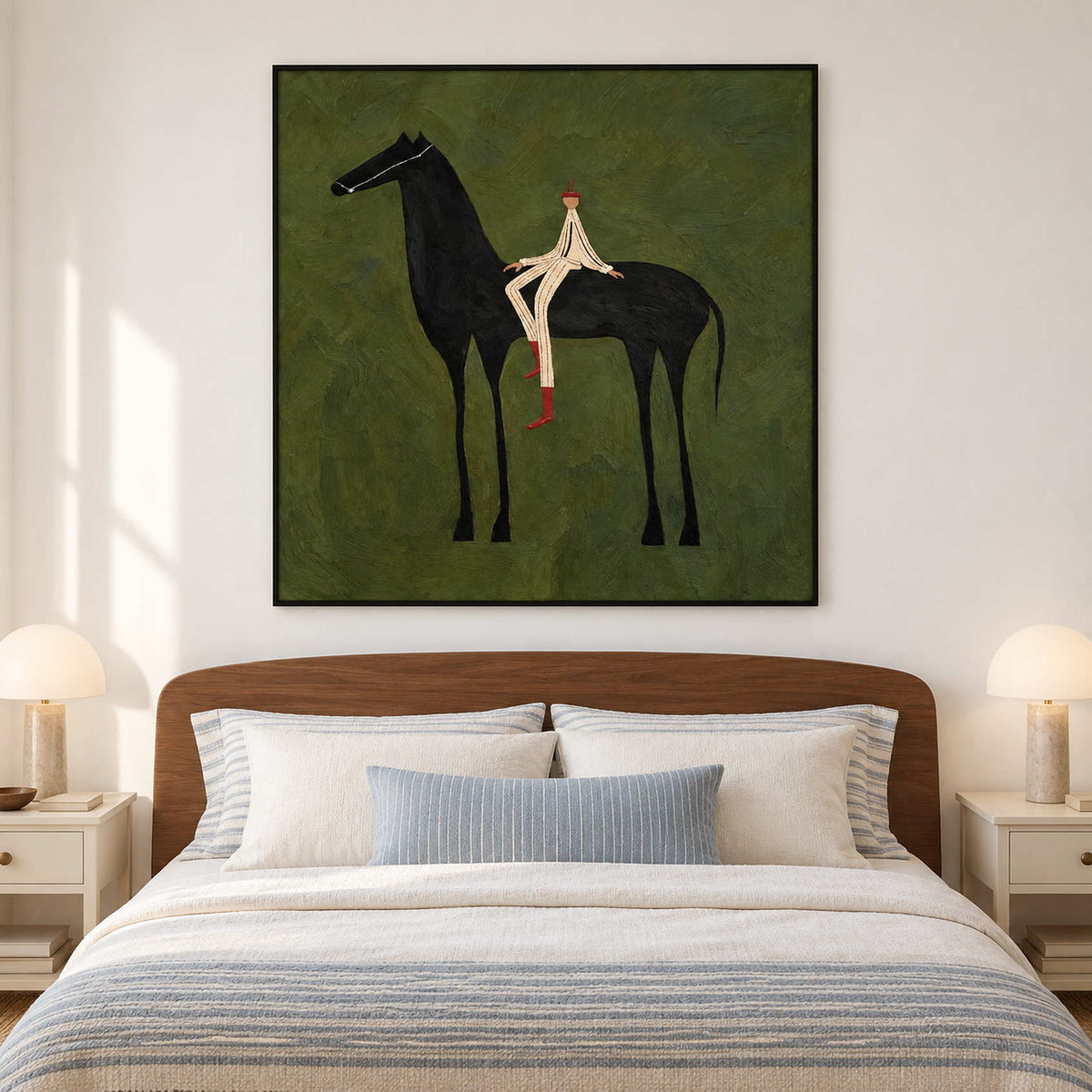 Black-framed green horse painting above a bed with blue-striped bedding.