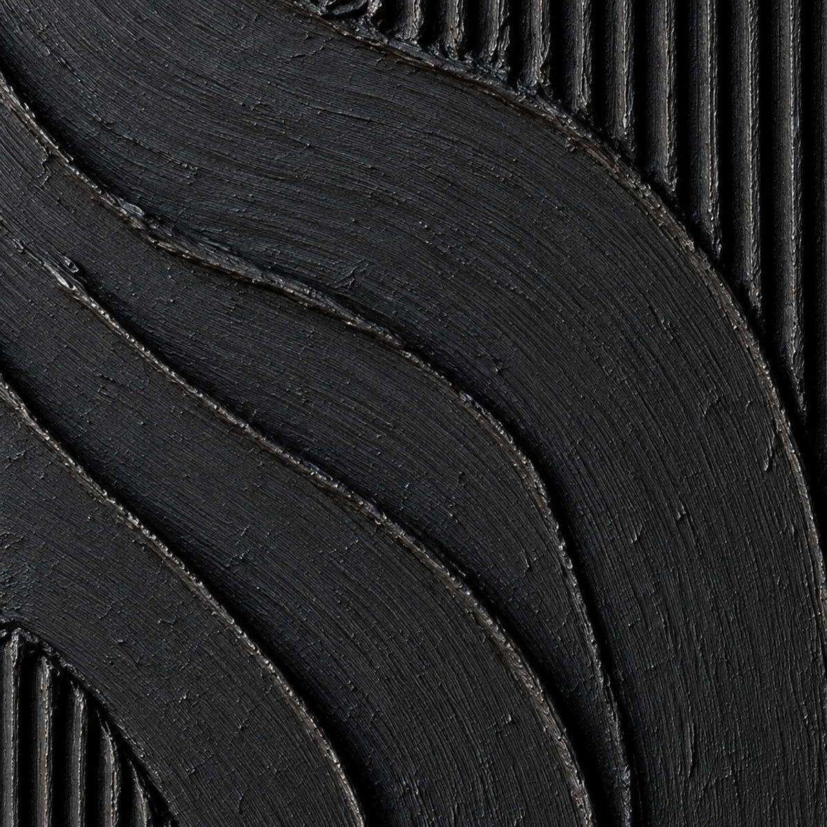 Detail of sweeping black bands with fine surface marks beside narrow raised vertical lines.