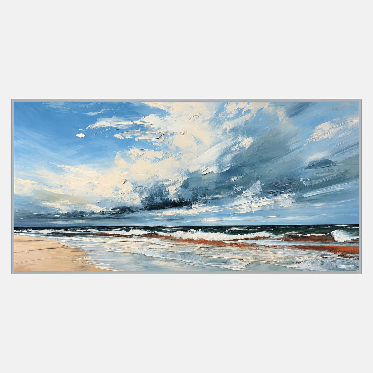 Wide coastal scene dominated by sweeping blue and cream clouds above a low horizon, white surf, and pale sand.
