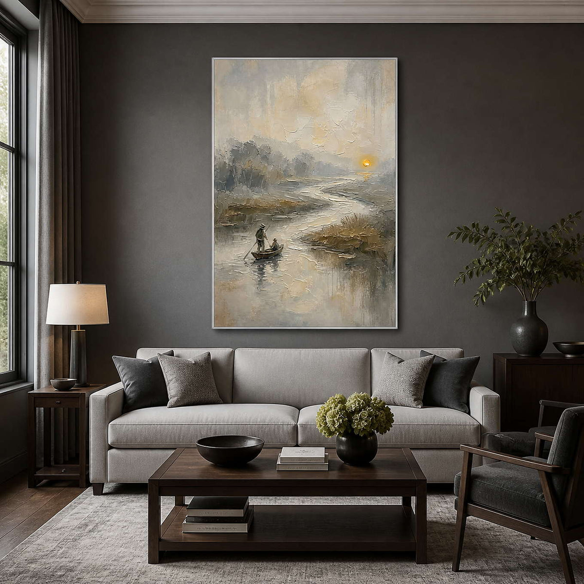 Misty river artwork displayed above a charcoal modern living room sofa.