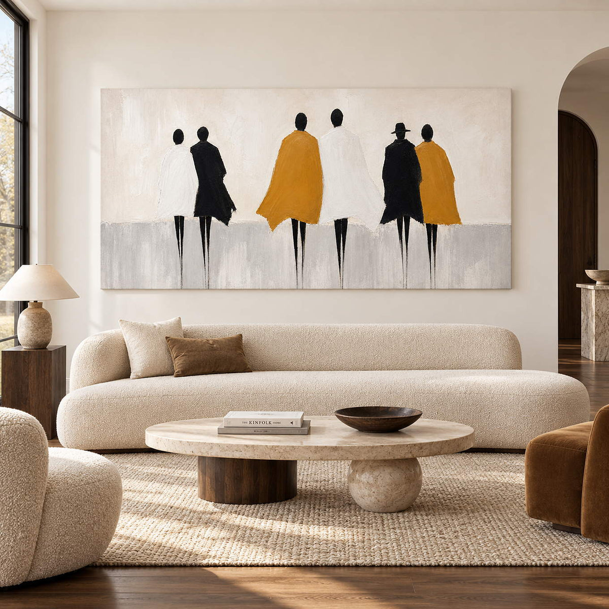Six hand-painted figures in black, ivory, and mustard coats, displayed in a living room without an outer frame.
