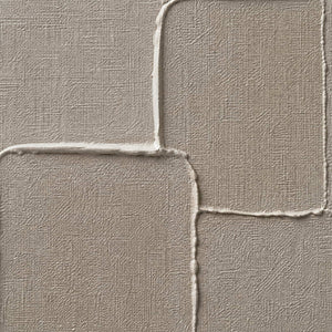 Close-up of warm gray layered blocks and fine woven canvas texture.