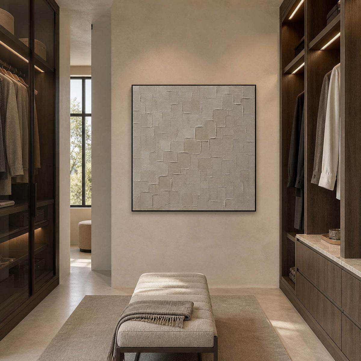 Textured minimalist artwork displayed in a warm gray dressing room.