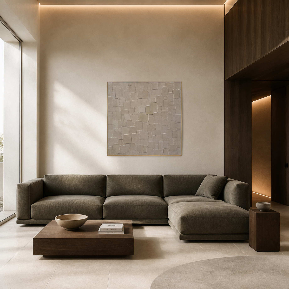 Textured minimalist wall art displayed in a warm ivory stone living room.