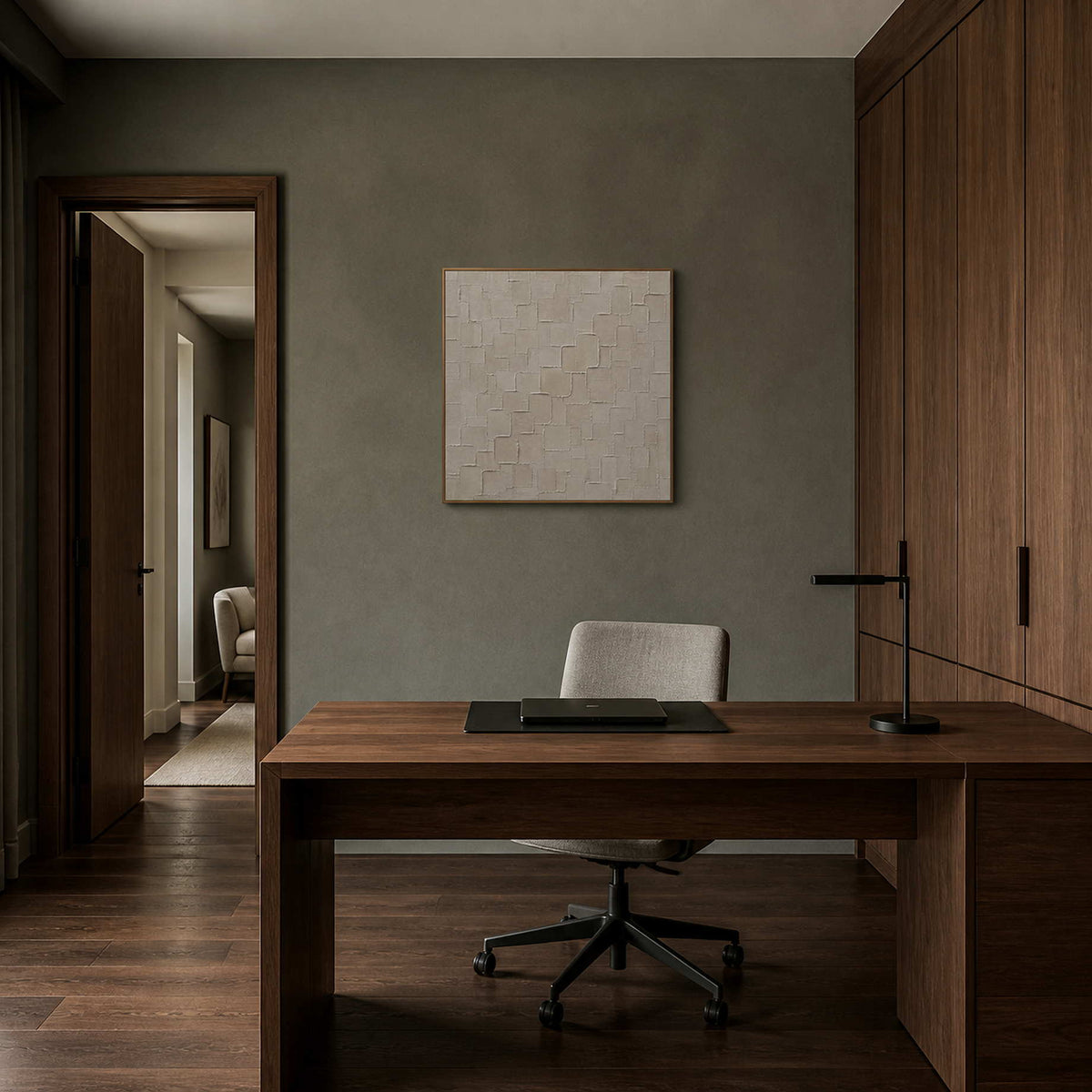 Square neutral artwork displayed in a deep olive-gray walnut office.