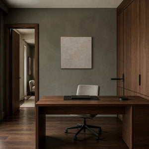 Square neutral artwork displayed in a deep olive-gray walnut office.