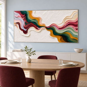 Wide abstract behind a round dining table with burgundy chairs.
