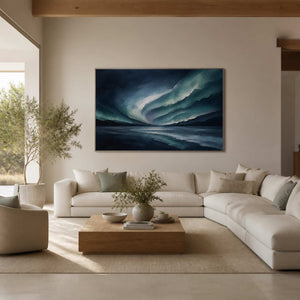 Textured blue ocean wall art displayed in a bright neutral living room.