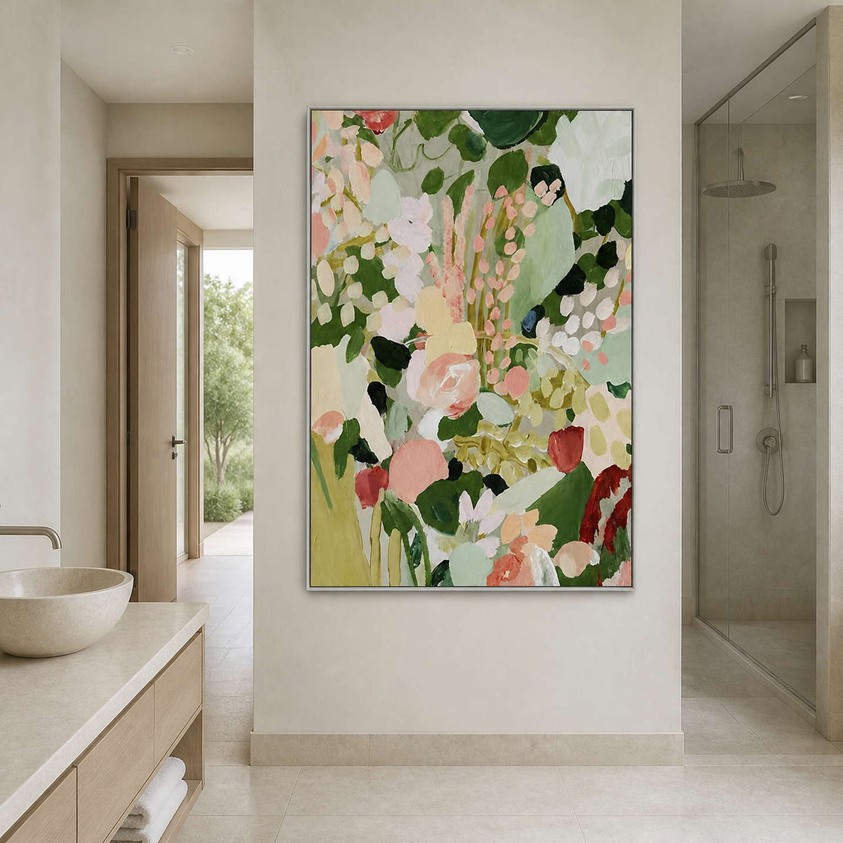 Silver framed floral painting between a bathroom vanity and glass shower enclosure.
