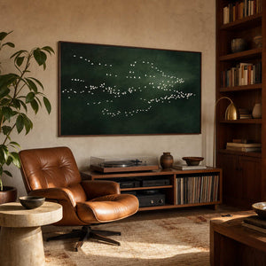 Bird wall art brings quiet movement to a vintage listening room.