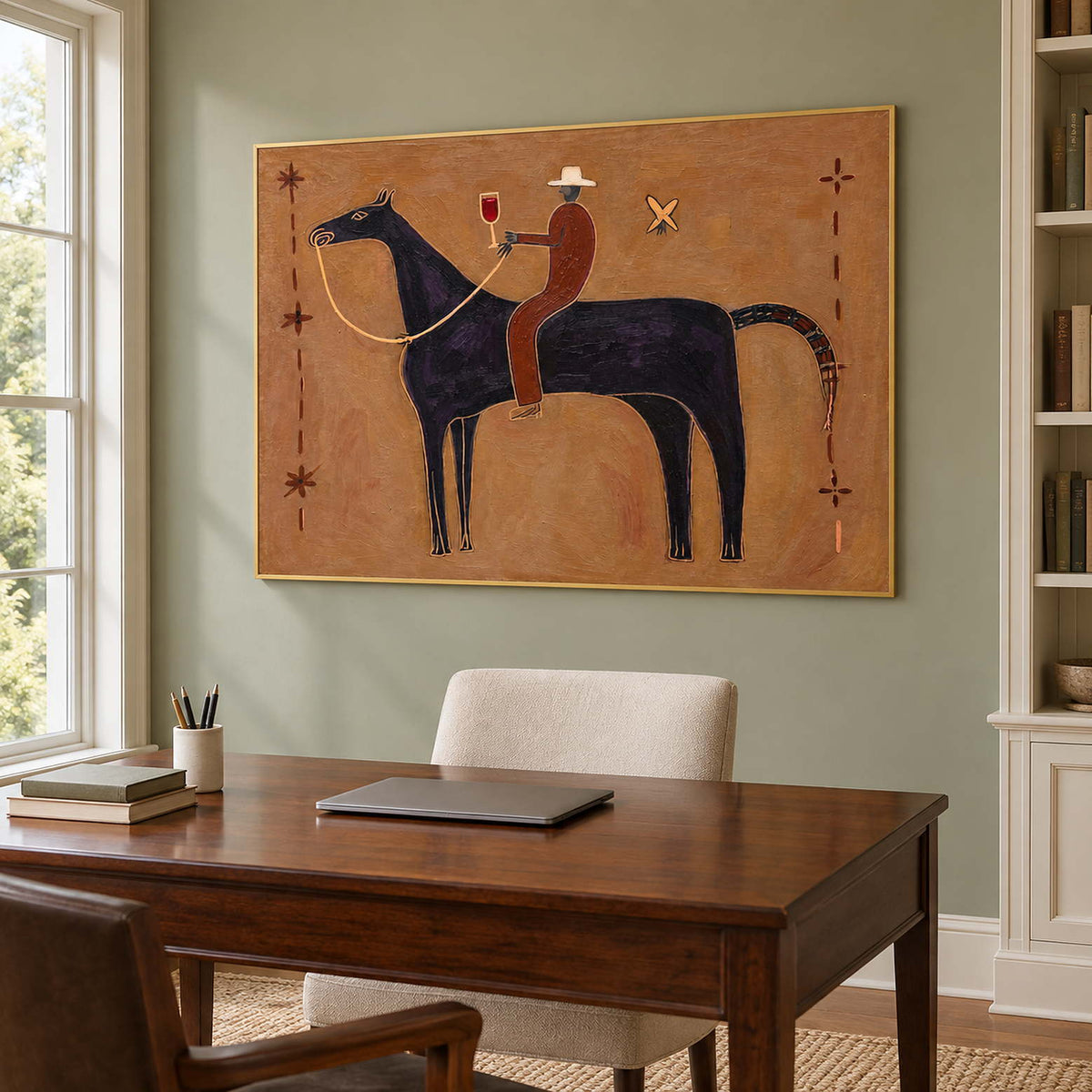Black horse artwork over a wooden desk against a green wall.