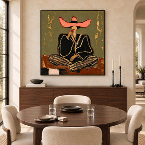 A Toast to Freedom in a black frame above a wood sideboard beside a round dark dining table and cream chairs.