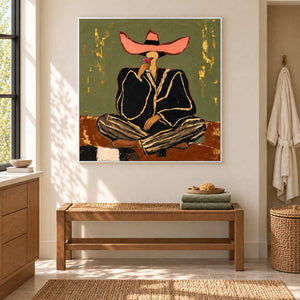 A Toast to Freedom in a white frame above a woven bench with green towels beside a bathroom vanity.