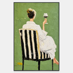 A woman in white raises a wine glass from a striped chair against green.