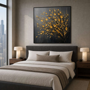 Black and gold botanical wall art above a Chicago bedroom.
