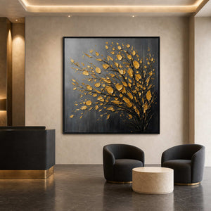 Square gold tree painting displayed in a Dubai luxury hotel lobby.