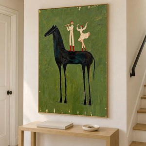 Olive-green horse artwork above a narrow console beside a stairway handrail.