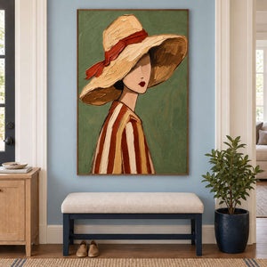 Tall green portrait over a cream entryway bench beside a dark planter.