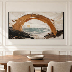 Hand-painted coastal abstract with a bronze arch sea-glass water and quiet sun, displayed in a dining room in a black frame.