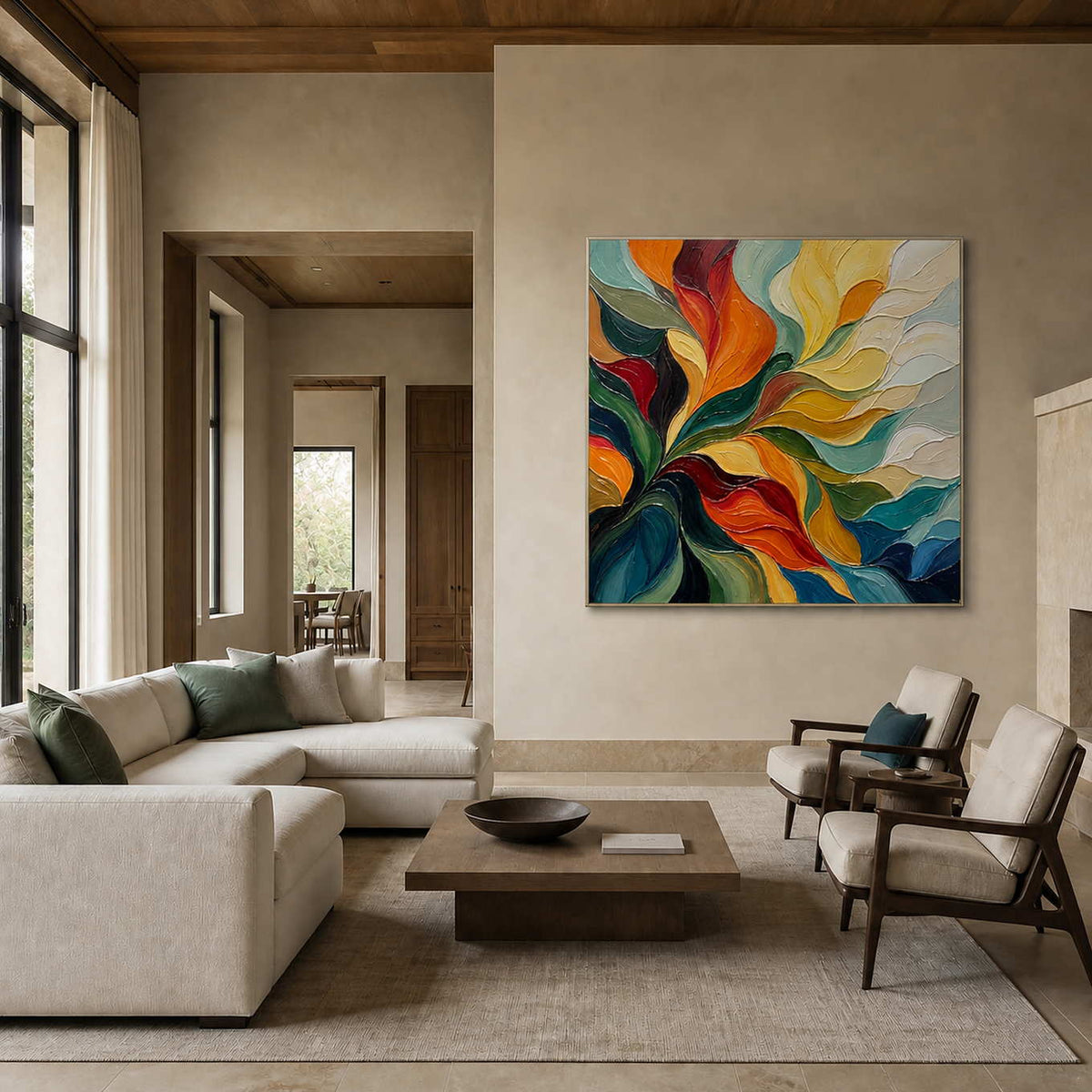 A Warm Embrace abstract painting in a silver frame above a cream sofa in a warm stone living room.