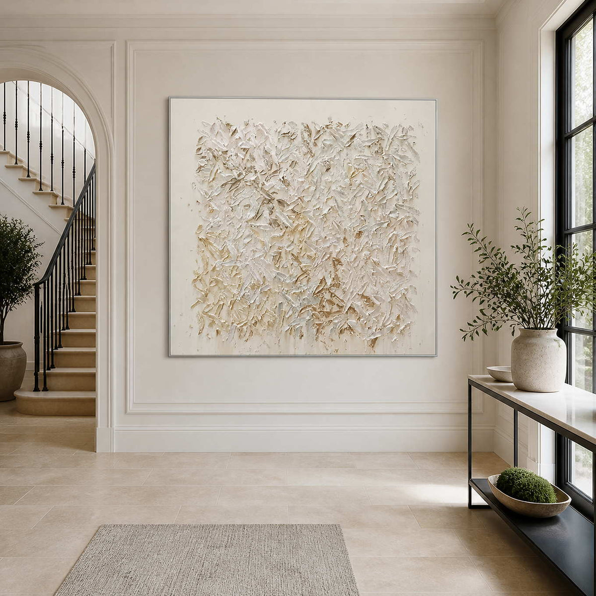 A tonal painting bringing depth to a quiet neutral living room