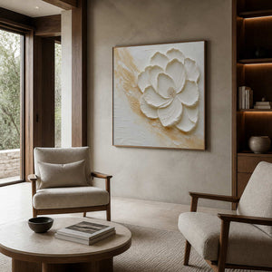 White and gold botanical canvas displayed in a walnut reading lounge.