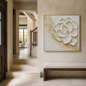 Textured flower wall art displayed in a warm stone residential entryway.