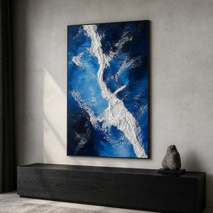 Blue and white vertical wall art in a contemporary private office.