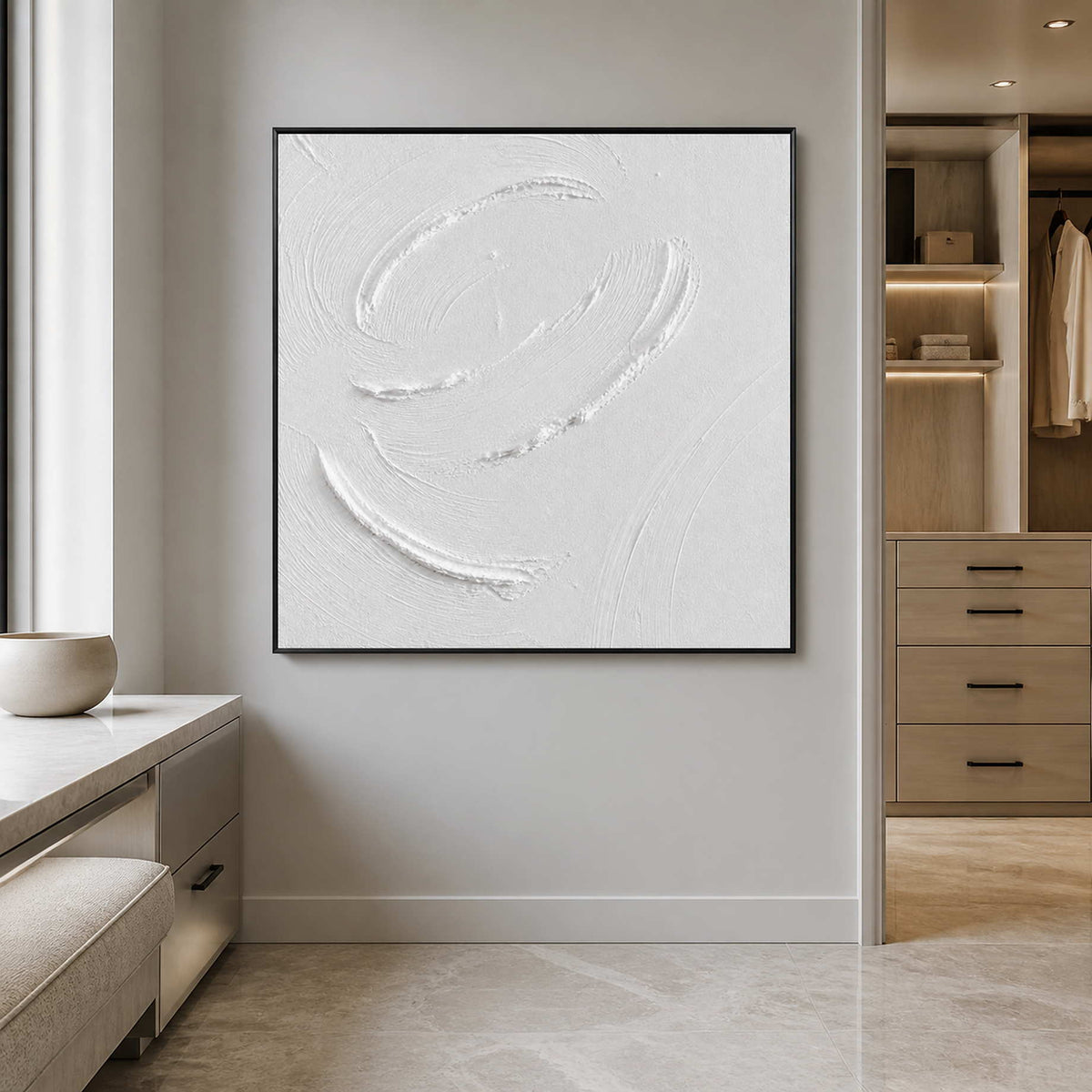 White circular abstract wall art displayed in a serene luxury bathroom.