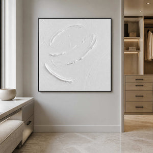 White circular abstract wall art displayed in a serene luxury bathroom.