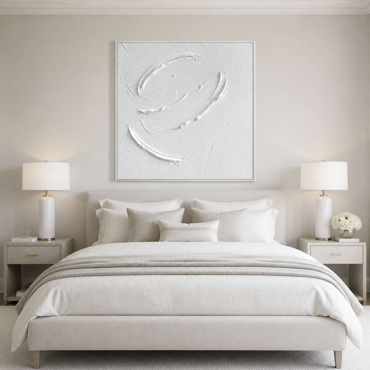 Calm white minimalist wall art displayed above a luxury primary bedroom.
