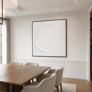 Square white textured wall art displayed in a refined American dining room.
