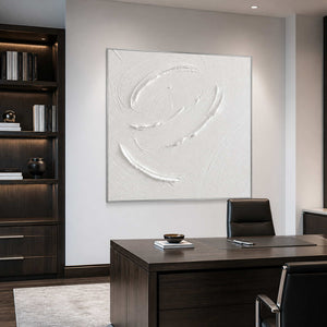 Square textured minimalist wall art displayed in a modern private office.
