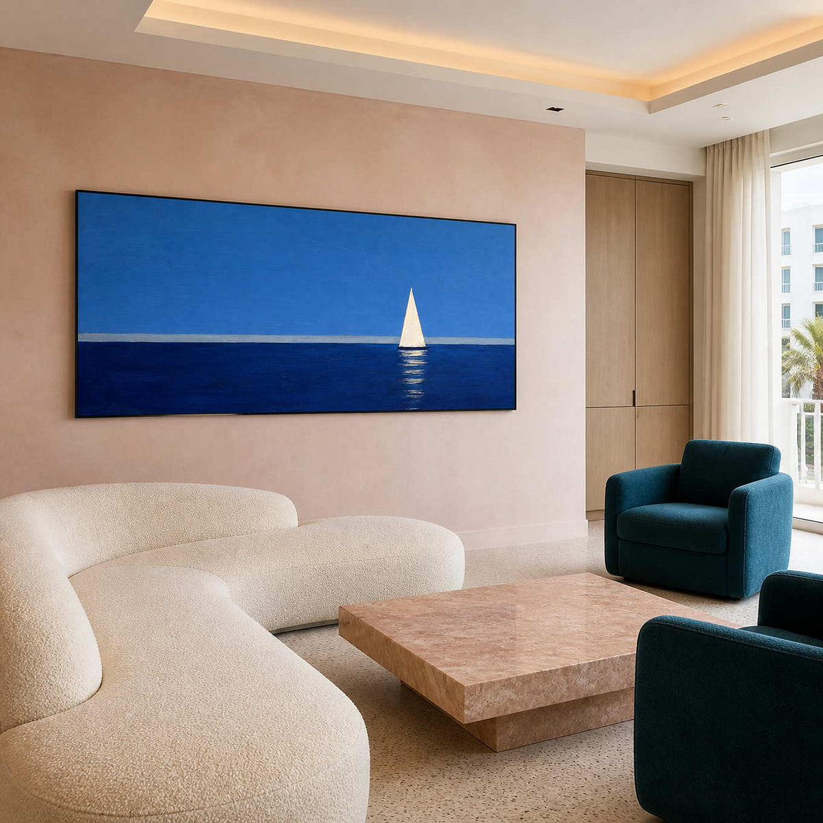 Blue sailboat wall art displayed in a bright modern living room.