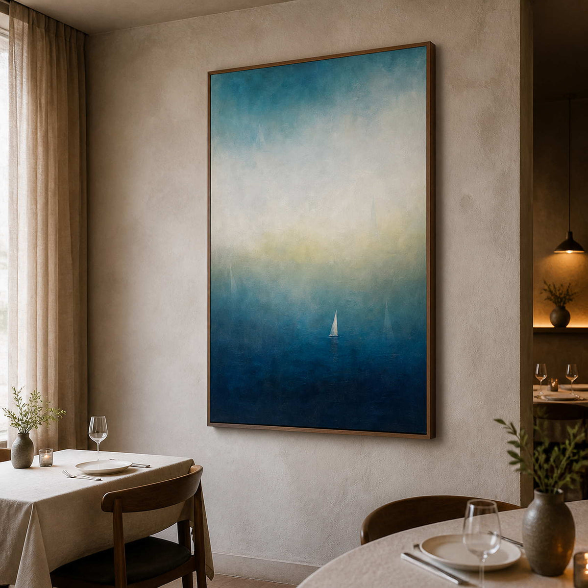 Textured teal ocean artwork displayed in an elegant boutique dining room.