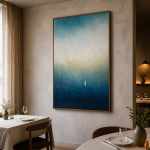 Textured teal ocean artwork displayed in an elegant boutique dining room.