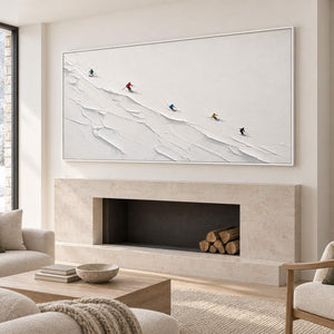 Tiny colorful skiers crossing a ridged white slope in a white frame, displayed above a fireplace.