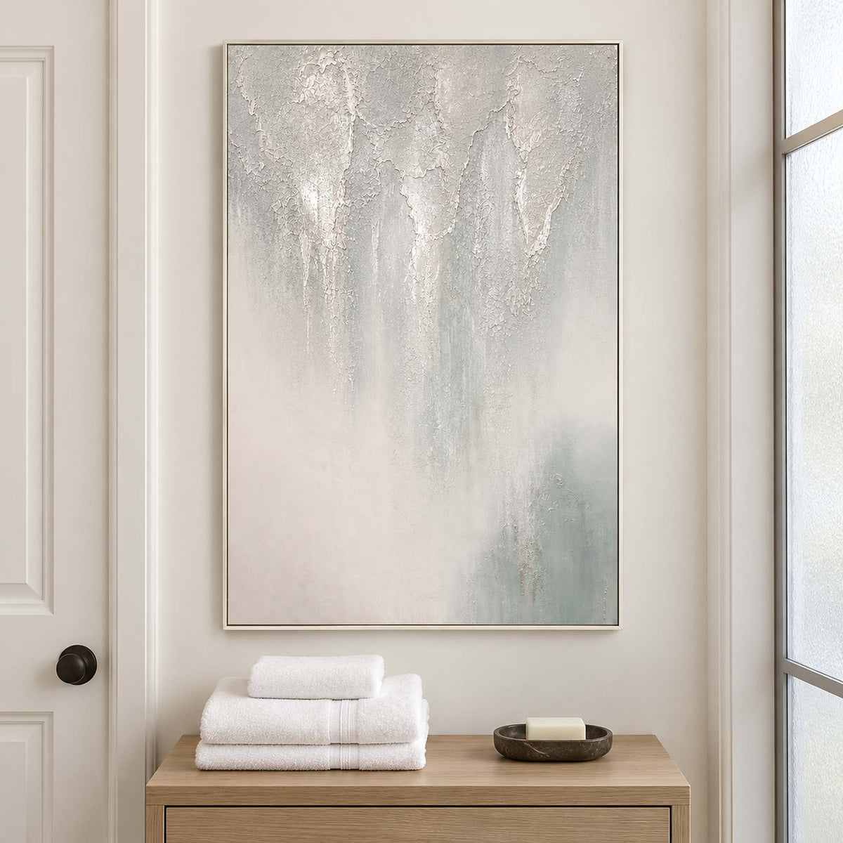 Soft gray and ivory vertical textures fading into pale blue in a white frame, displayed in a bathroom dry area.