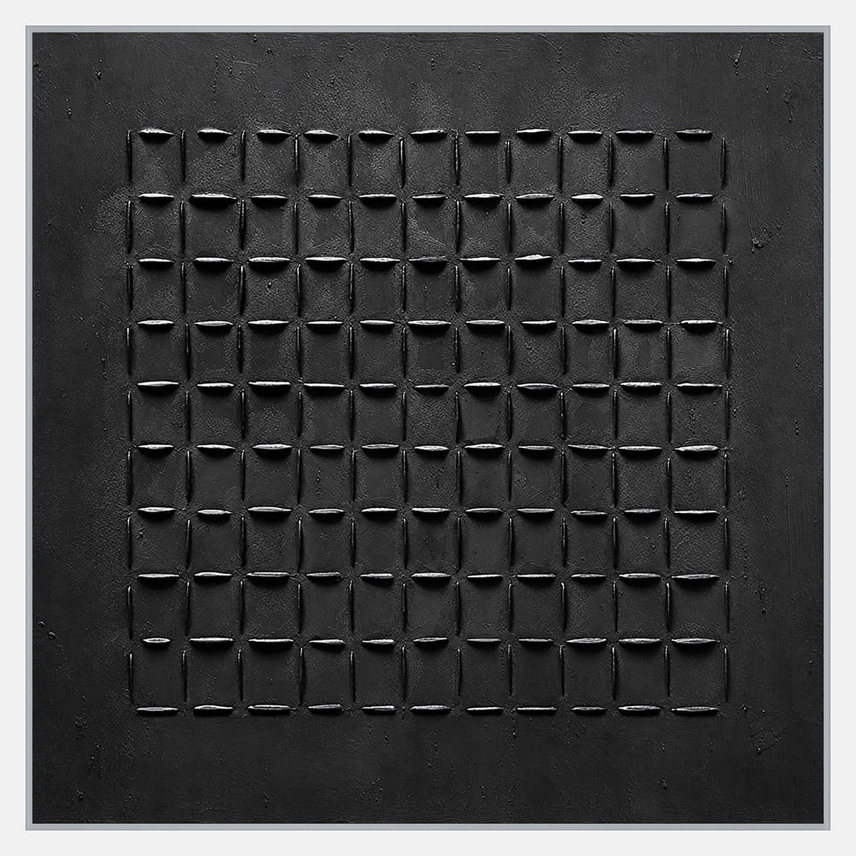 Square black abstract artwork with a centered grid of raised rectangular outlines and a wide textured border.