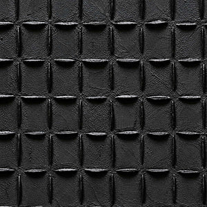 Close-up of raised black grid edges with bright upper highlights and shadowed rectangular gaps.