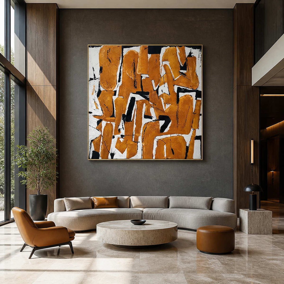 Gold-framed An Eager Embrace above a cream sofa in a tall boutique hotel lobby.
