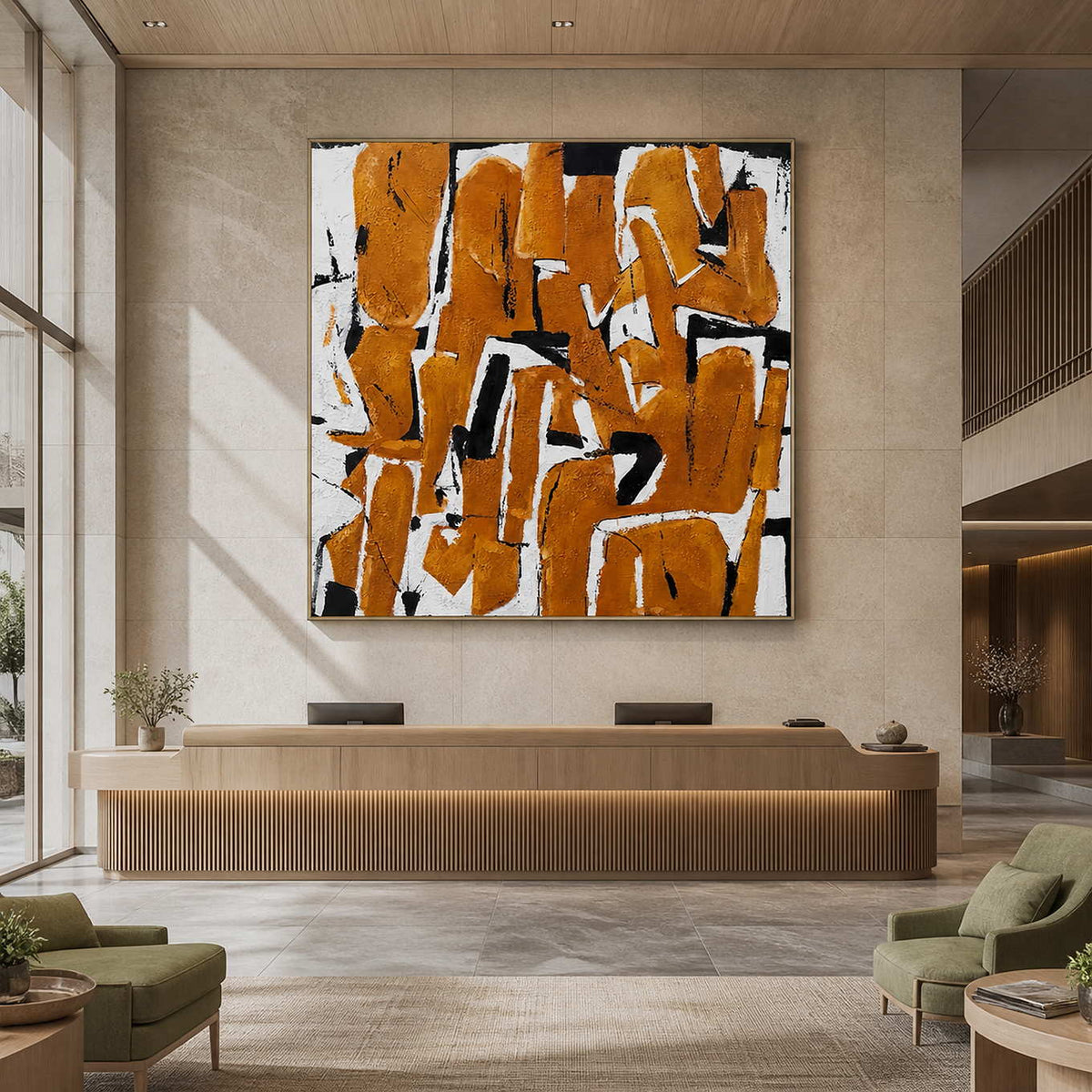 Silver-framed square abstract artwork above a light wood reception desk with pale green waiting chairs.