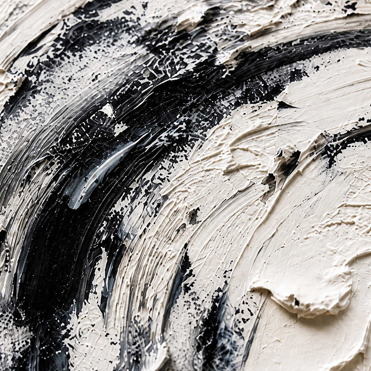 Close view of rough white paint ridges crossed by sweeping black and gray strokes.