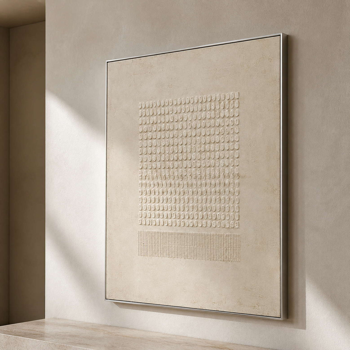 Sculptural ivory artwork viewed from the side in a quiet entry gallery.