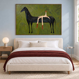Horse-and-rider art above a bed with a burgundy throw.