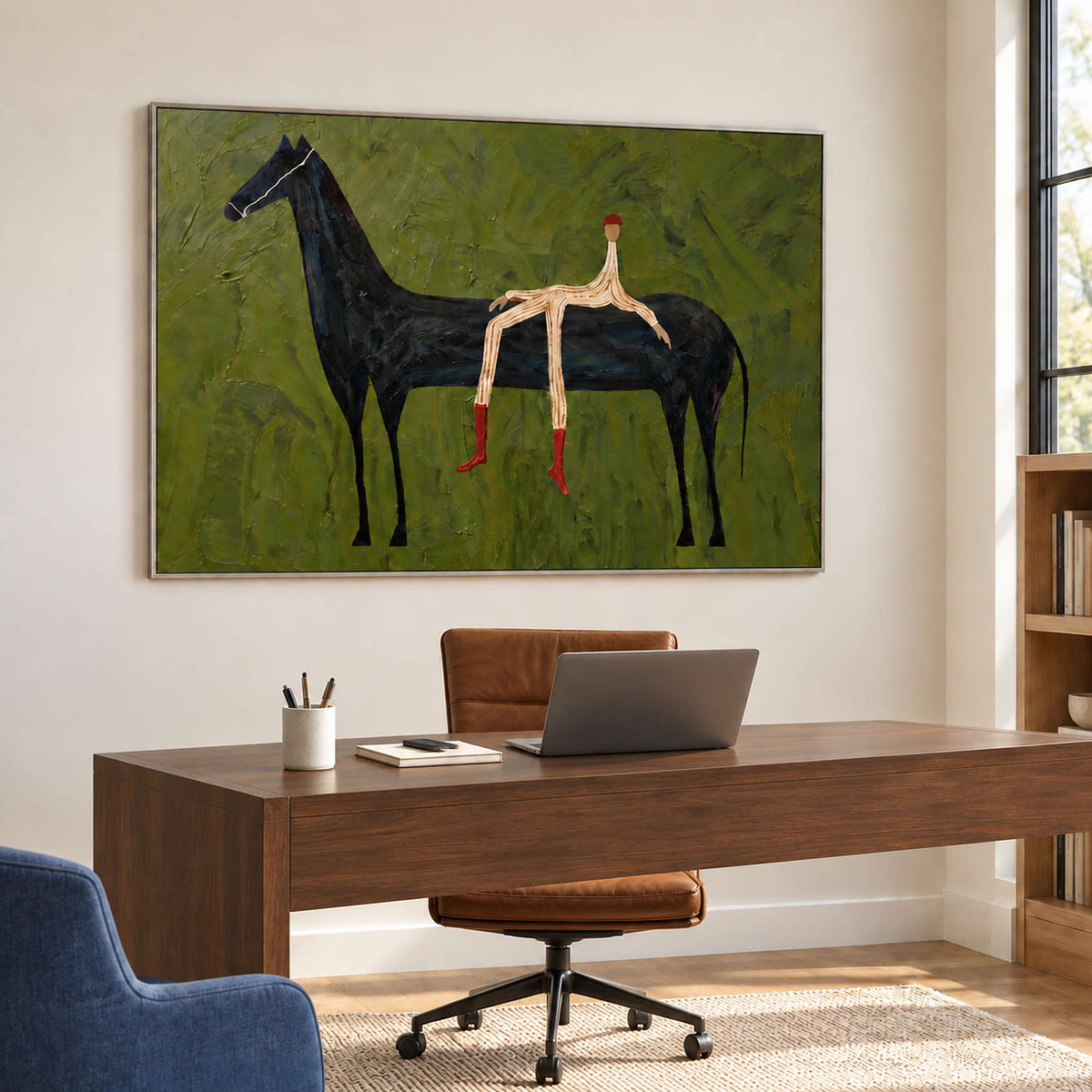 Relaxed rider painting above a wooden office desk.
