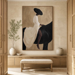 Wood framed equestrian painting above cabinetry in a warm bathroom dressing area.