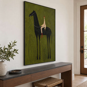 Angled view of horse-and-rider art above a dark-topped console.