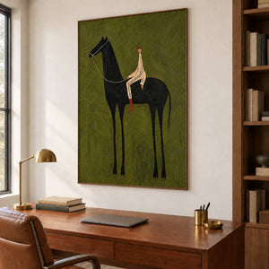 Minimalist rider artwork above a wooden desk beside shelving.