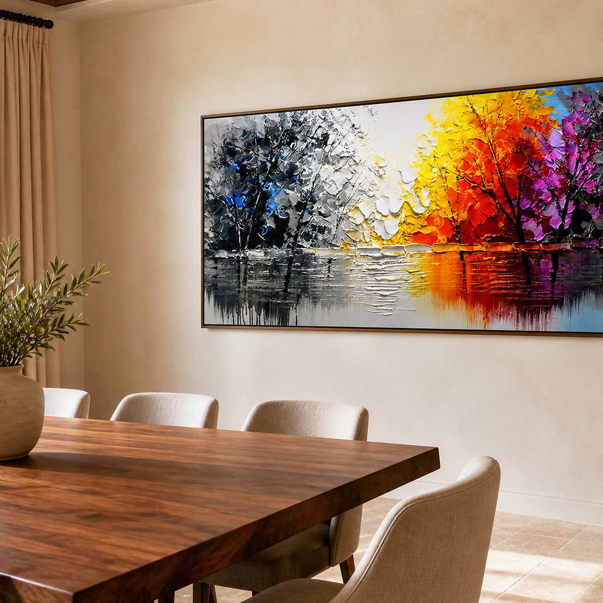 Wood-framed autumn landscape with vivid orange reflections beside a wooden dining table.